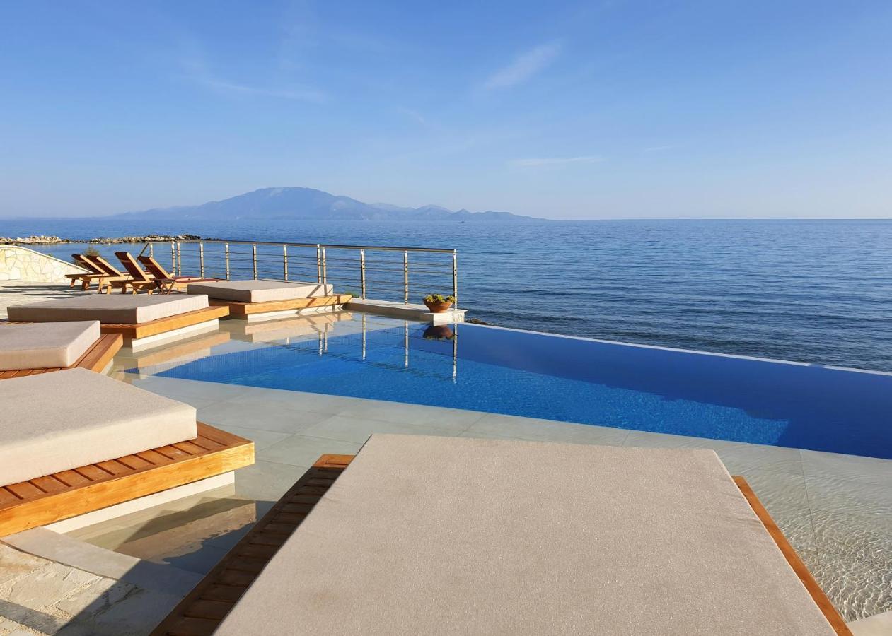Tsamis Zante Suites (Adults Only) Psarou  Exterior foto Infinity pool at the beach