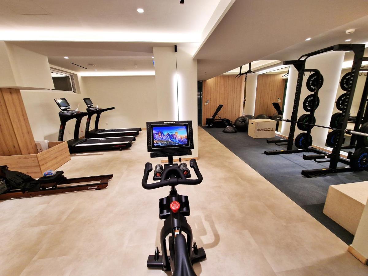 Tsamis Zante Suites (Adults Only) Psarou  Exterior foto Peloton Bike in a gym
